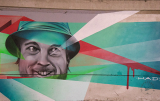 Mural in Mulhouse von einem Mann mit Hut
